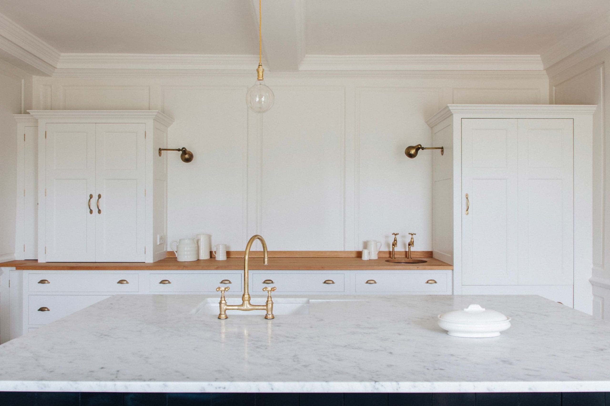  The Rectory Kitchen featuring bespoke Georgian Spitalfields cabinets with Carrara marble and Pippy Oak worktops. Hand painted in ‘Boiled Dishcloth’ from the Plain English range of paints.