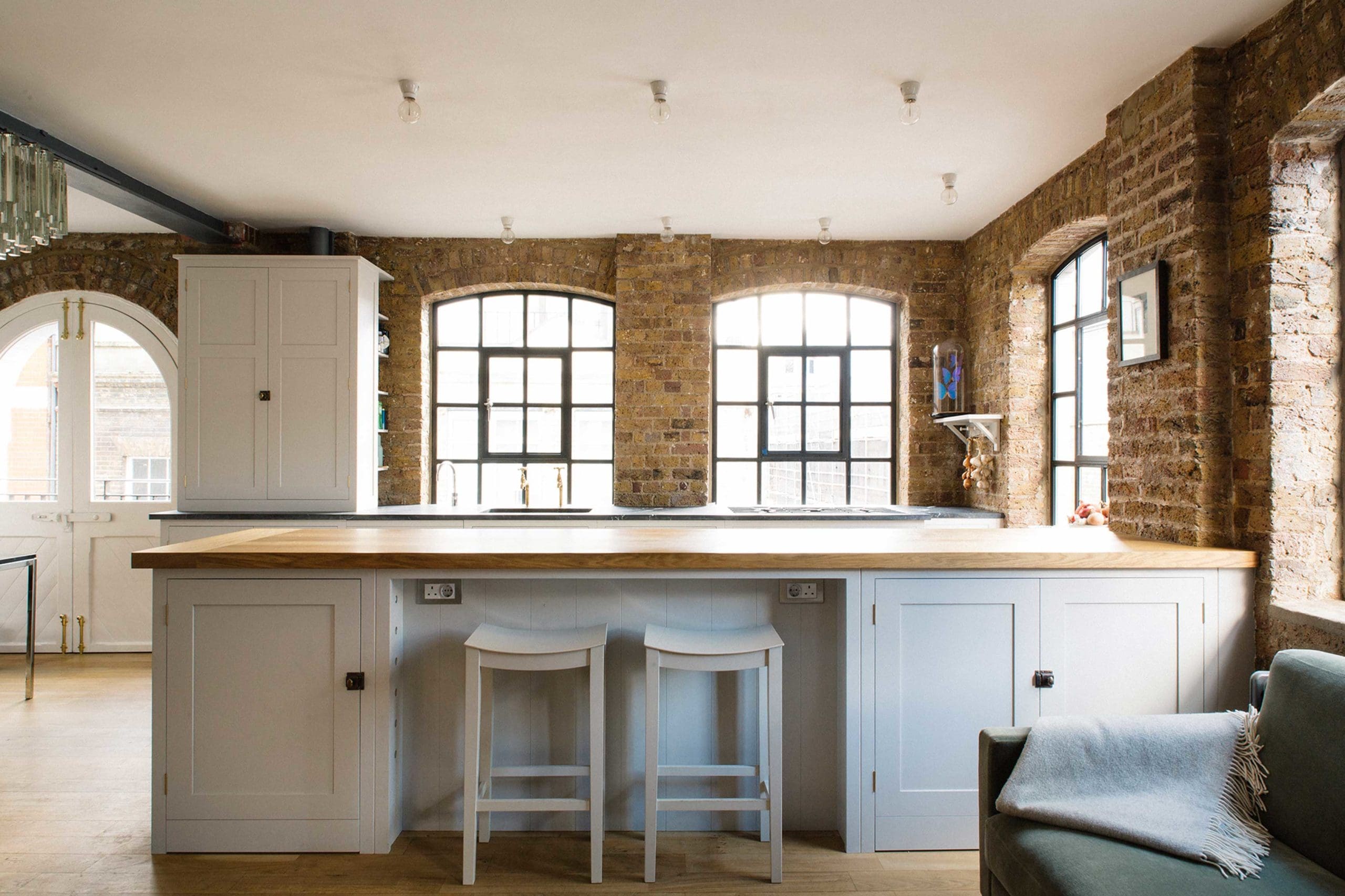 Open brick wall kitchen in Hoxton loft.